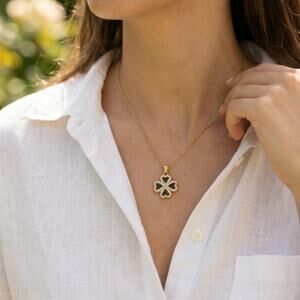 Elegant Gold Necklace with Four Leaf Pendant with Green Stones